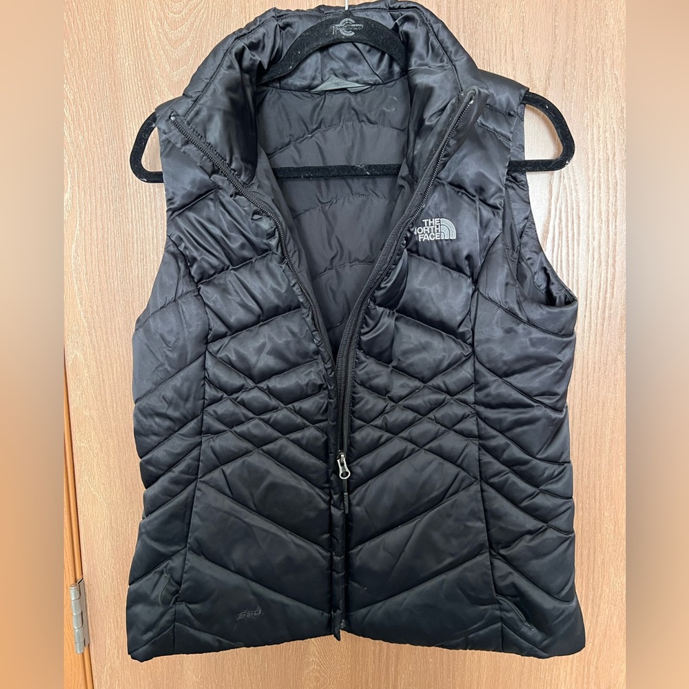 The North Face Black zip-up Vest. Size M.
